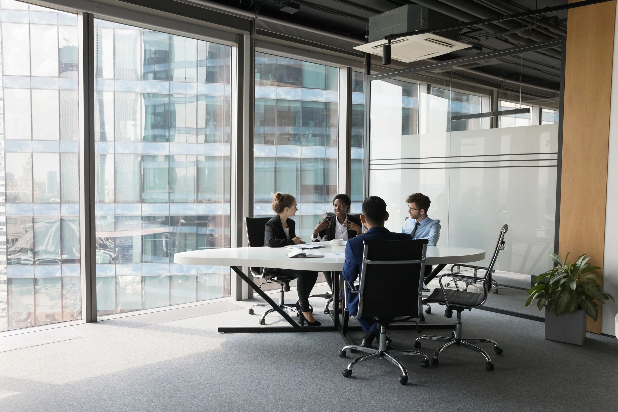 Executive recruiting discussion in a professional office